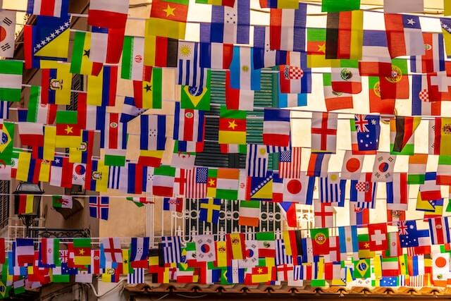 multi colored flags representing all countries in the world